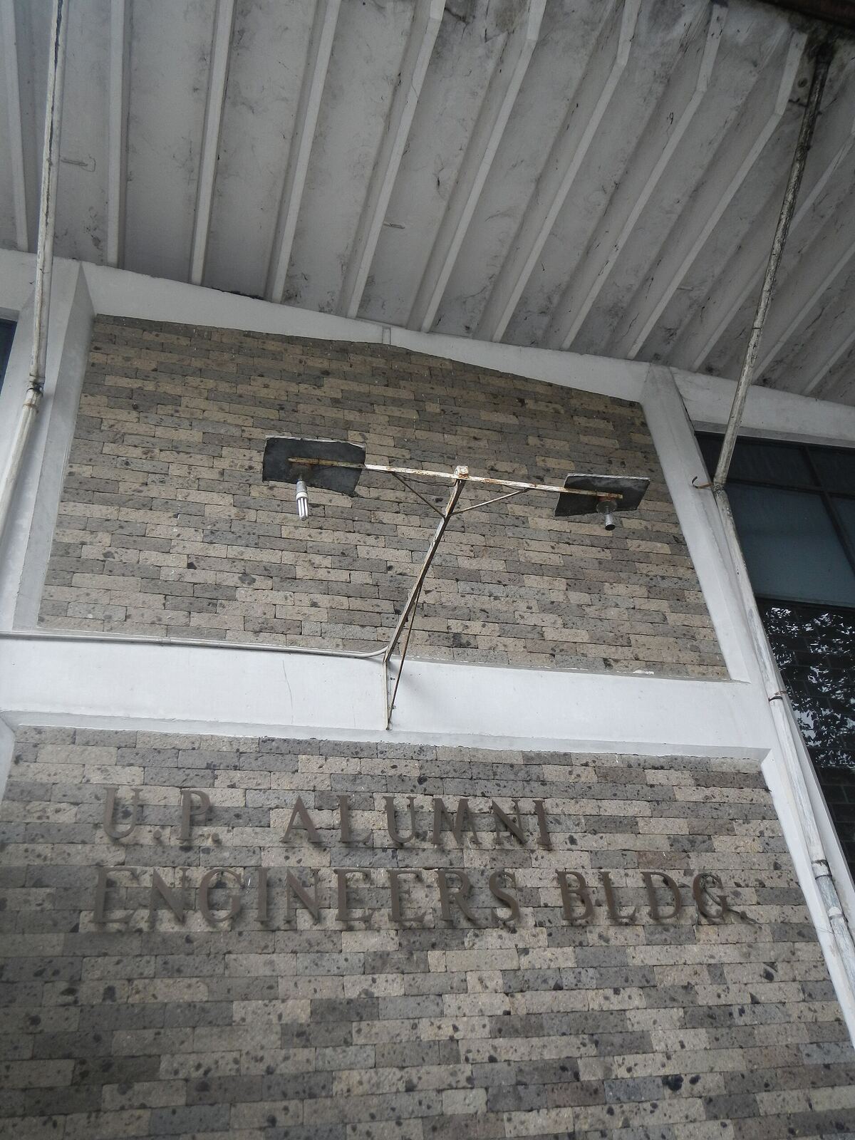 U.P. Diliman Building | Life of Internet The U.P. Alumni Engineers Building at the University of the Philippines, Diliman campus features a brick facade and signage.
